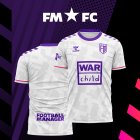 La camiseta de visitante de FMFC 22 recauda casi 30 000 £ para War Child